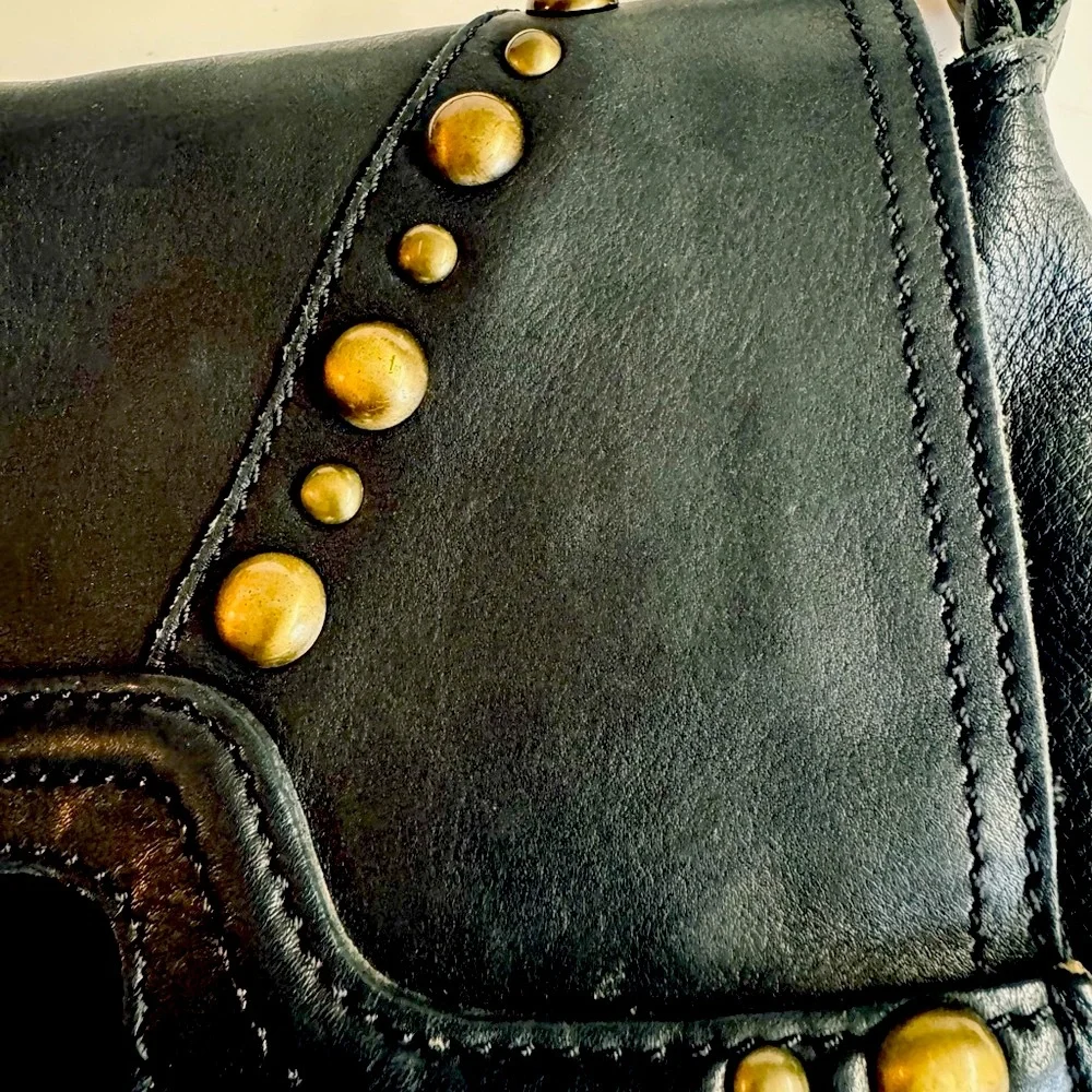 Lucky Brand Abbey fold over black leather studded messenger bag.Very Clean.